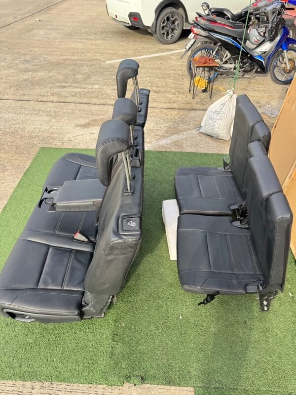 Genuine leather car seat set removed from Ford Everest 2020 (take-off condition). This complete second and third-row seat assembly includes integrated headrests, seat belts, center armrest with cup holders, and original rails for direct fitting - Image 5
